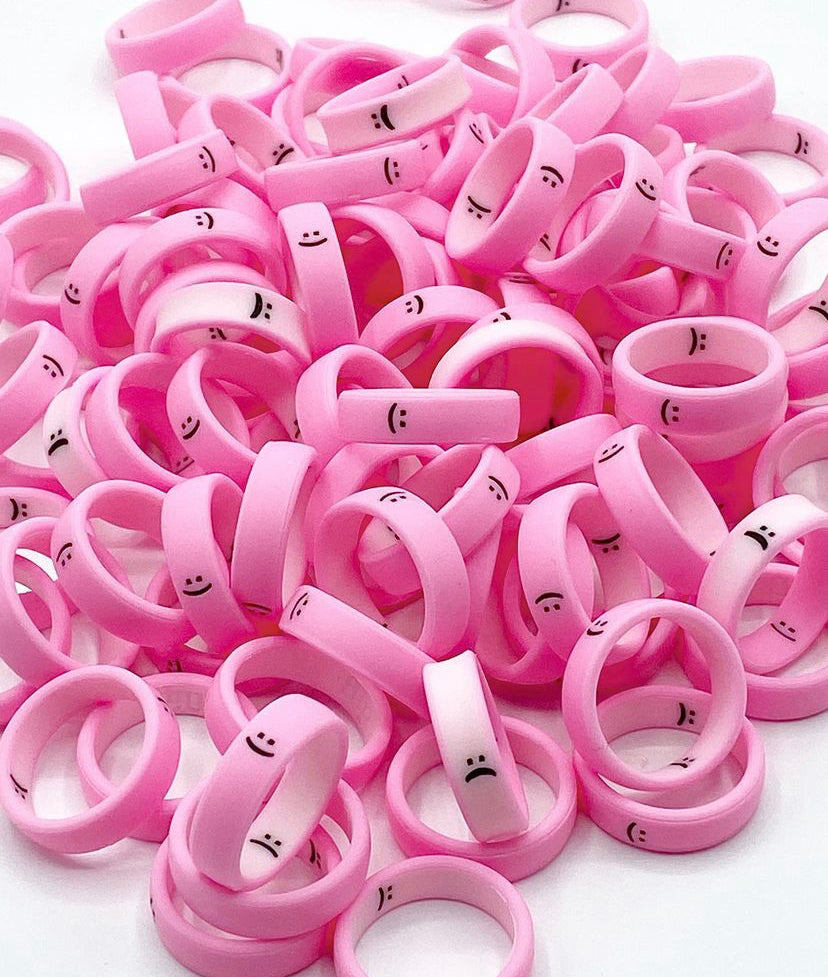 Flip Reversible smile / frown ring bubble gum