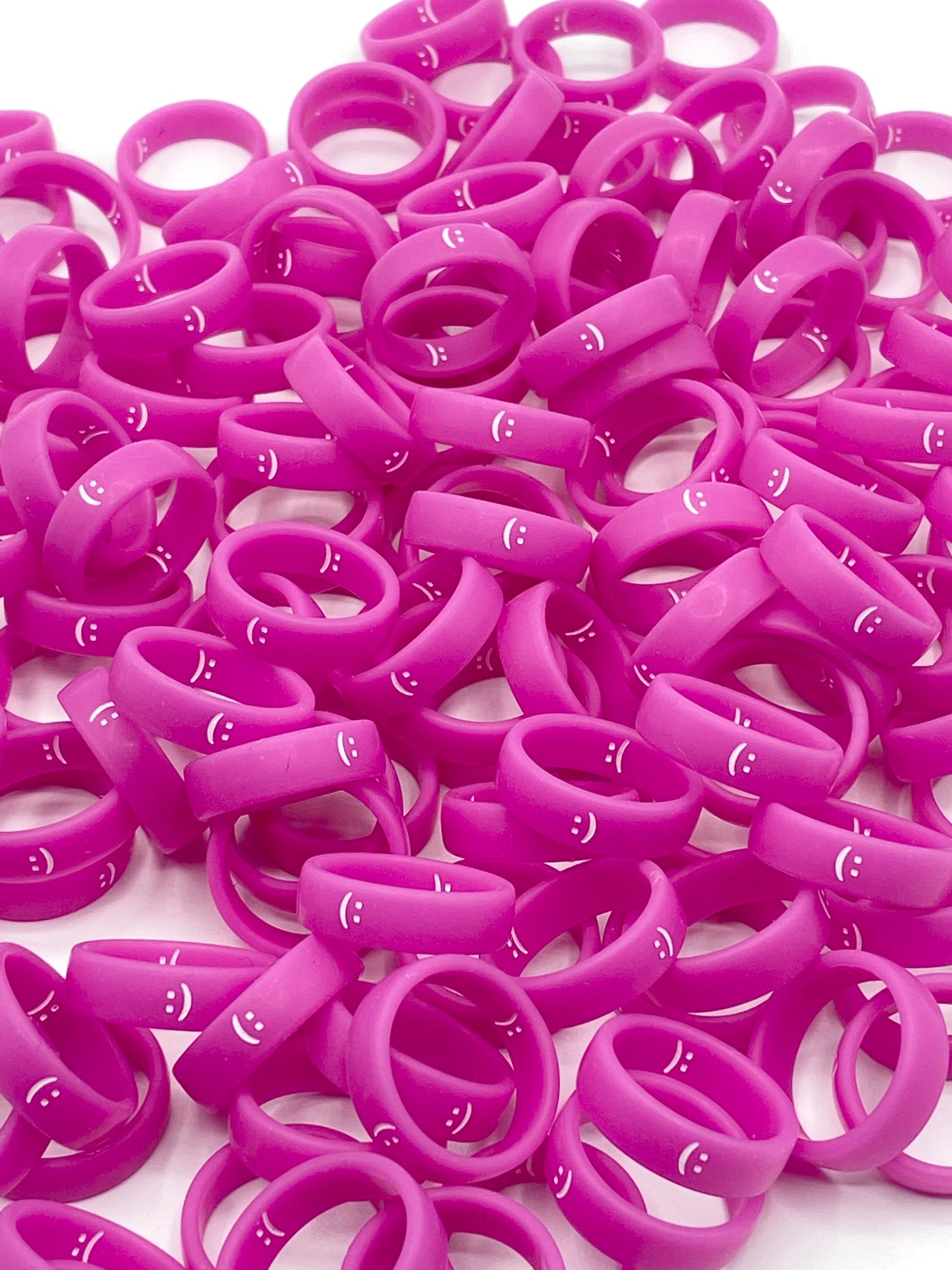 Flip Reversible smile / frown ring magenta