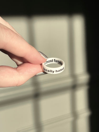 Flip Reversible locally hated / almost famous ring