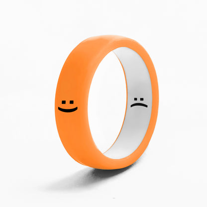 Flip Reversible smile / frown ring neon orange